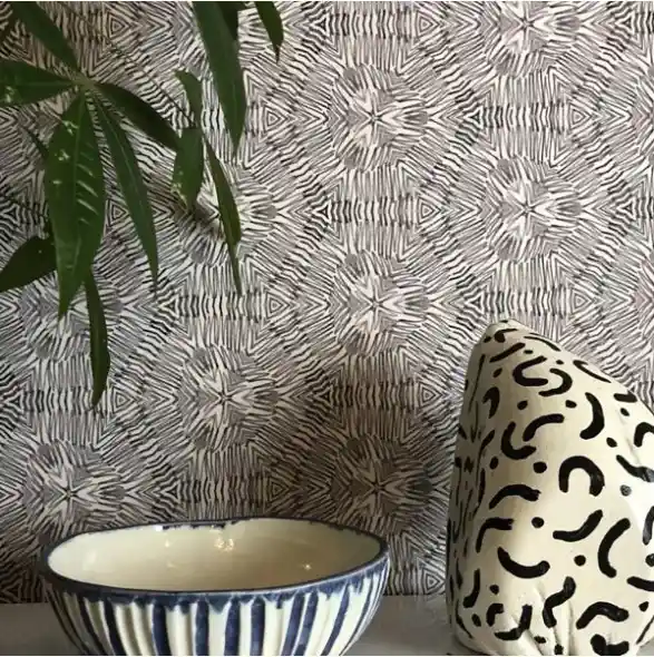Patterned PVC-free wallcovering on an interior wall